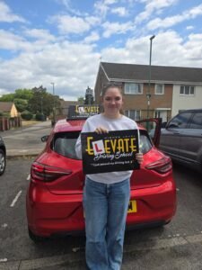 Beginner driver pass photo: female student passed her automatic driving test.