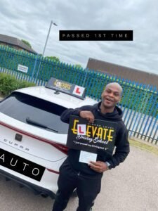 Success photo: student with driving instructor promoting intensive driving courses.