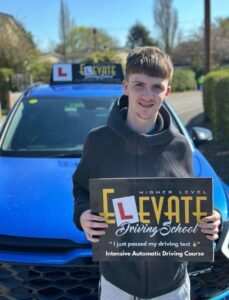 Male student passed intensive automatic driving course final exam.